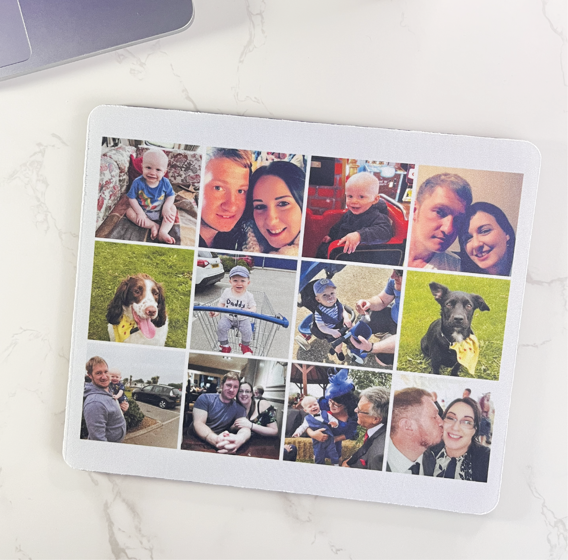 A rectangle mouse mat with 12 photos printed.